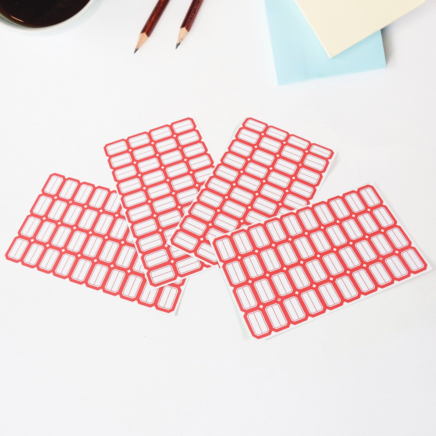 Stack of red border label stickers for versatile home and office organization.