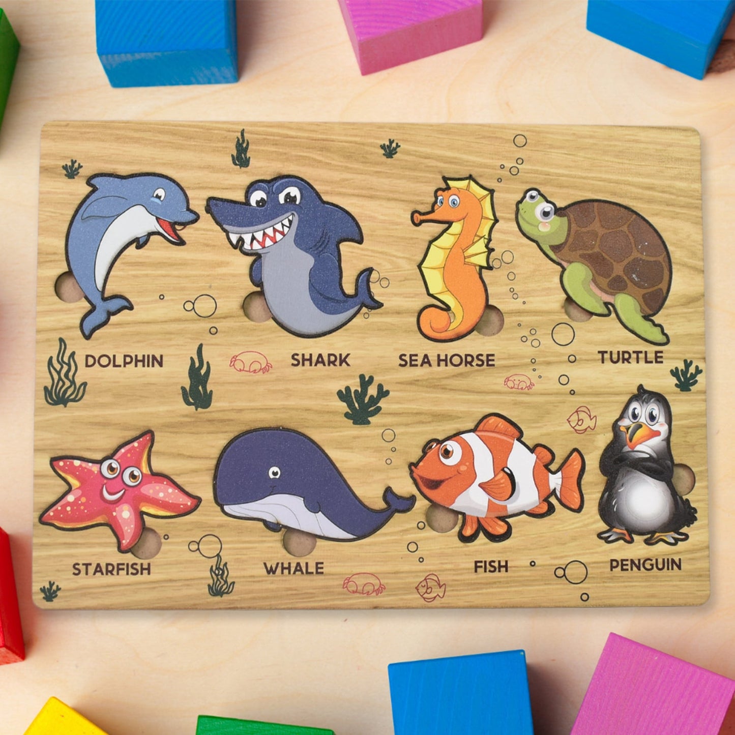 Wooden Sea Animal Puzzle board with vibrant ocean creatures for toddlers.