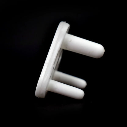 Multiple angles of the large electric socket cover in white.