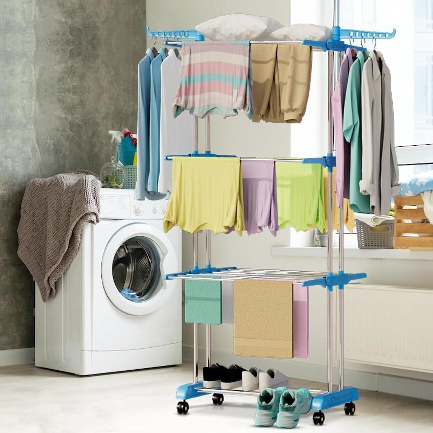 Clothes drying stand with vertically adjustable levels to fit various garment sizes.
