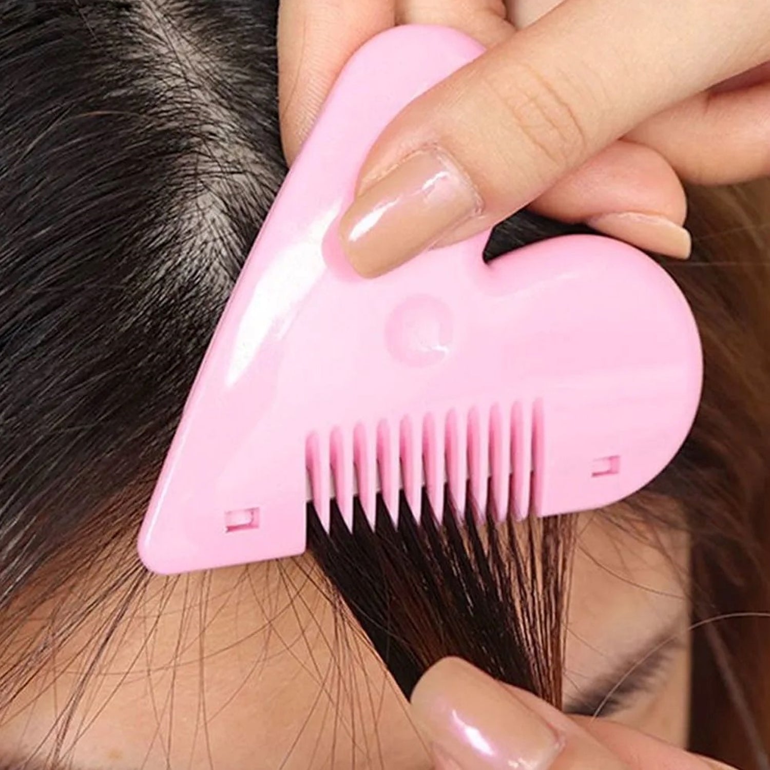 Gentle baby hair scissors with heart-shaped handle and sharp stainless steel blades.