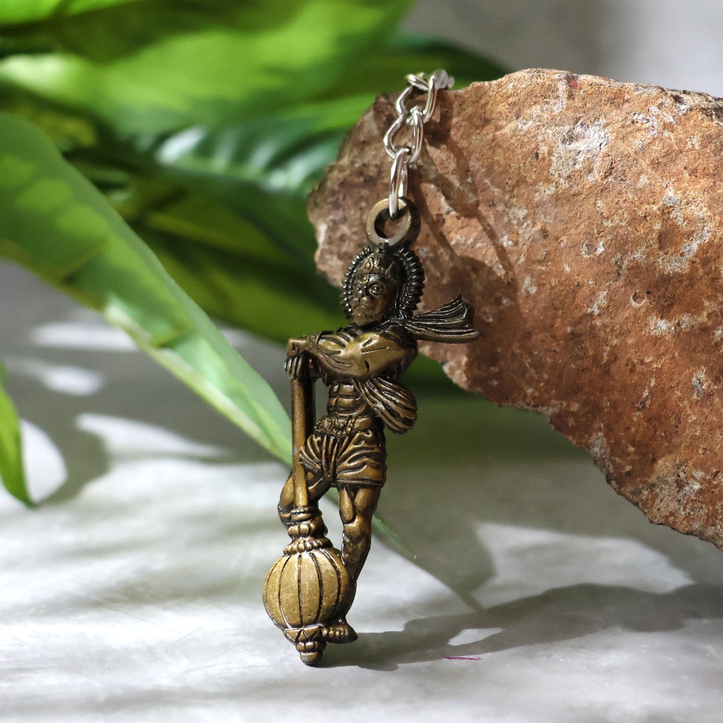 Lord Hanuman metal keychain on plain background highlighting design