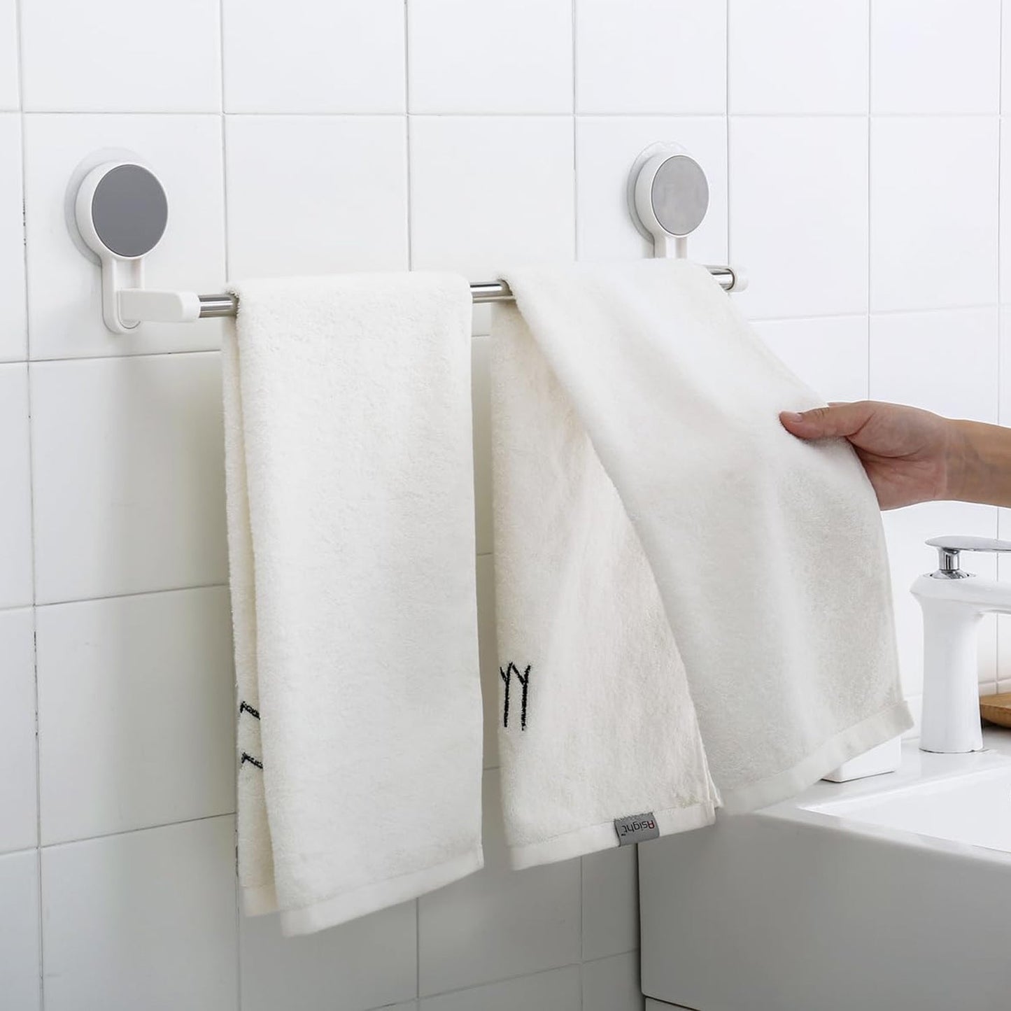 Punch-free towel rod with stable end brackets on smooth bathroom surface