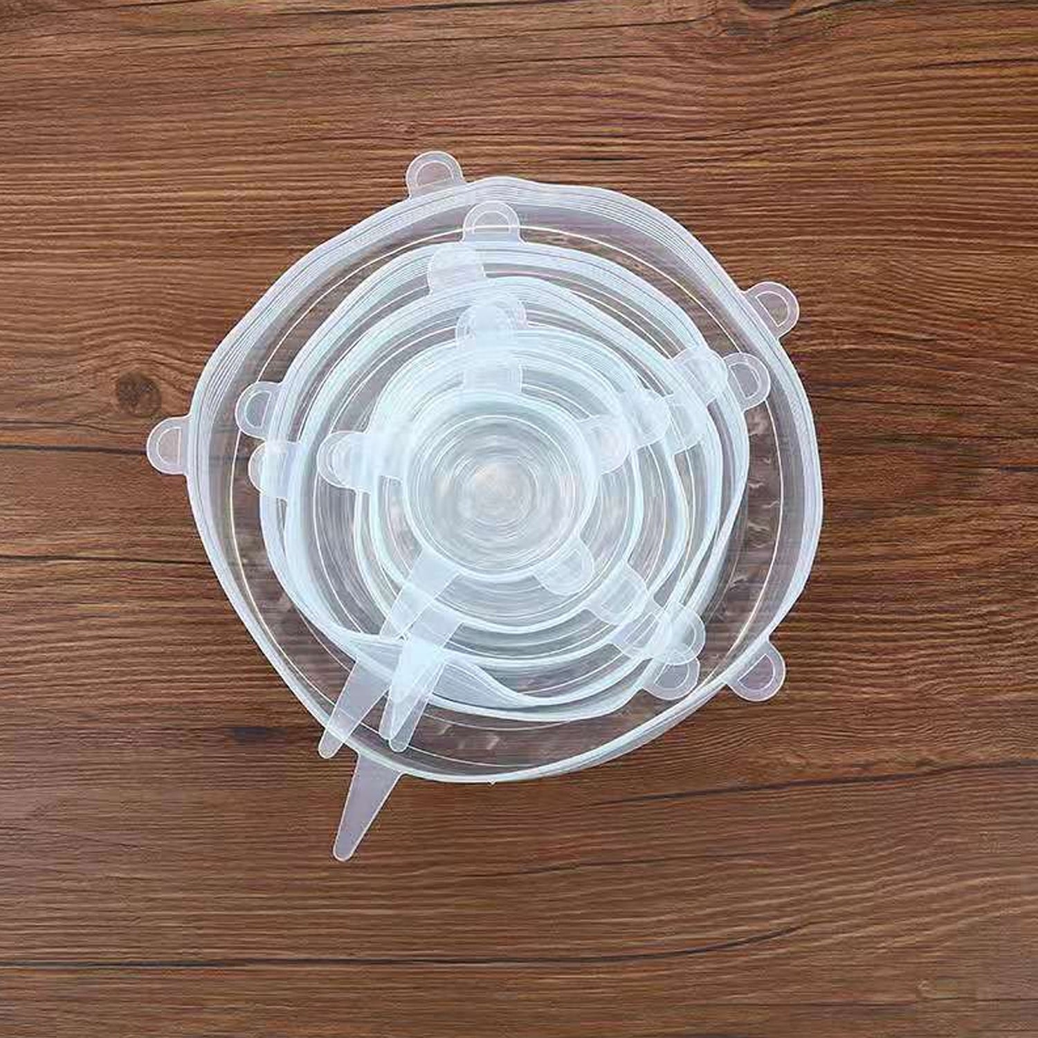 The complete 6-piece set of versatile silicone food covers arranged by size for convenient use.