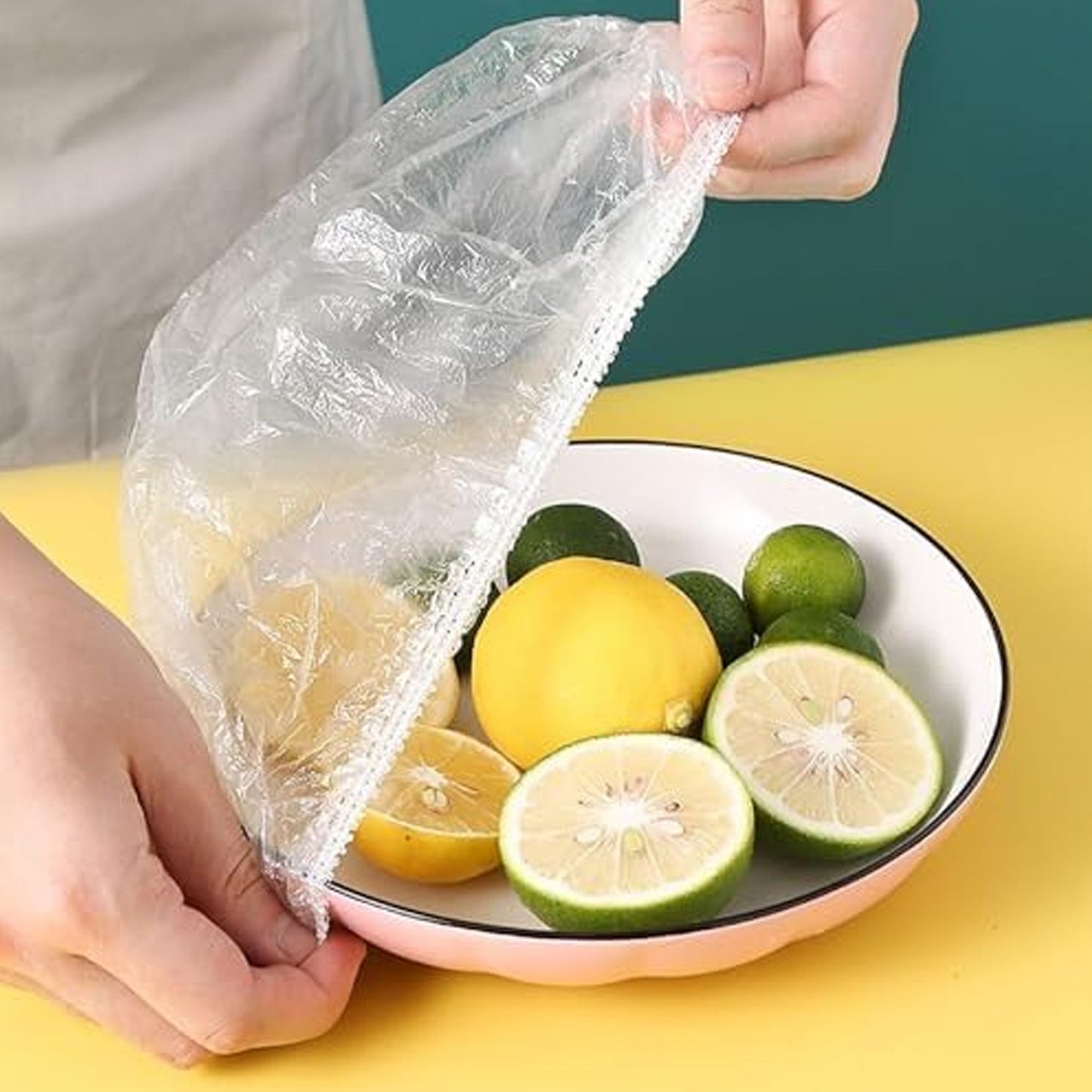 Assortment of disposable elastic food covers displayed, showcasing their versatility.