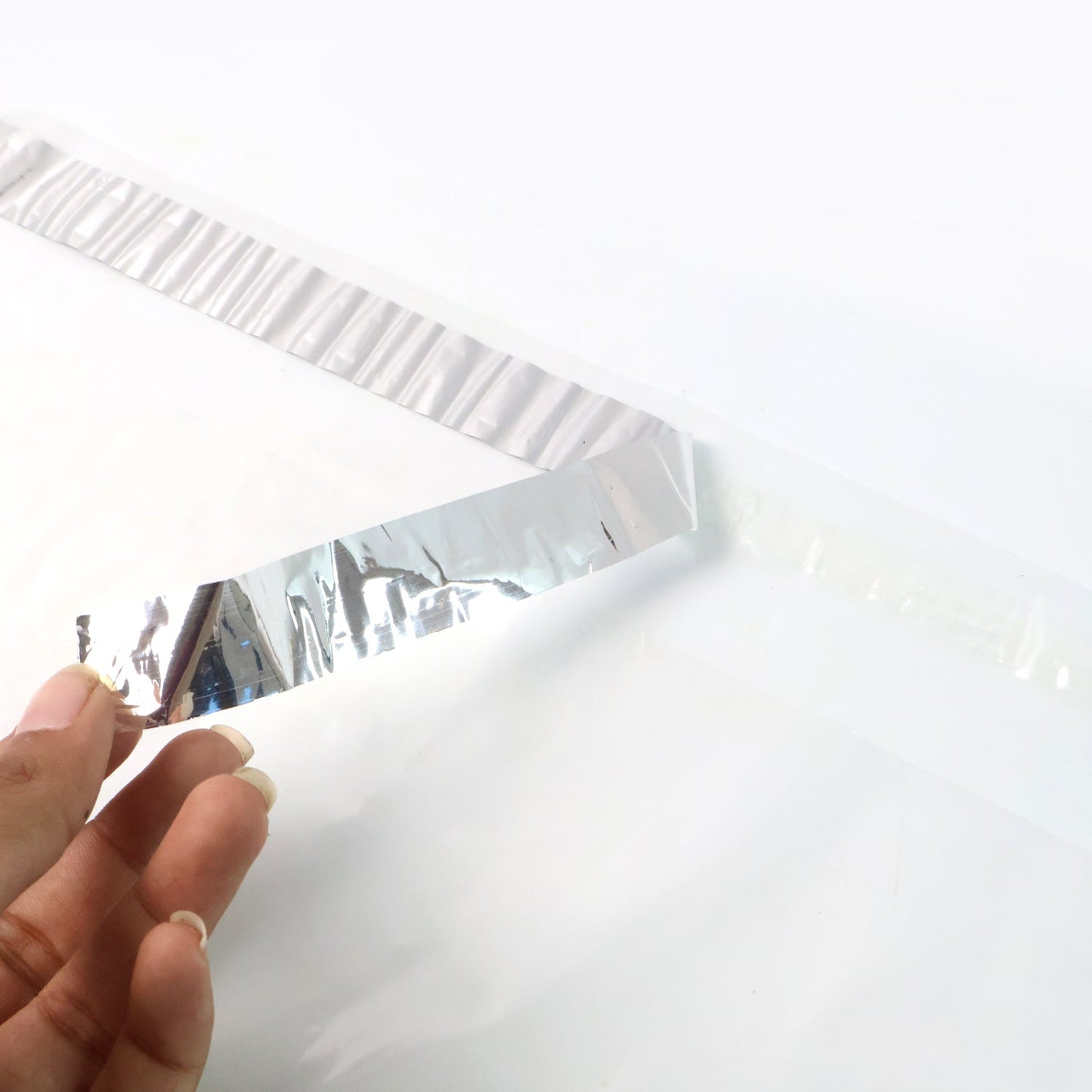 Courier polybag packaging close-up with tamper-proof seal