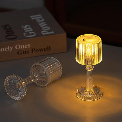 Crystal LED desk lamp illuminating a modern living space.