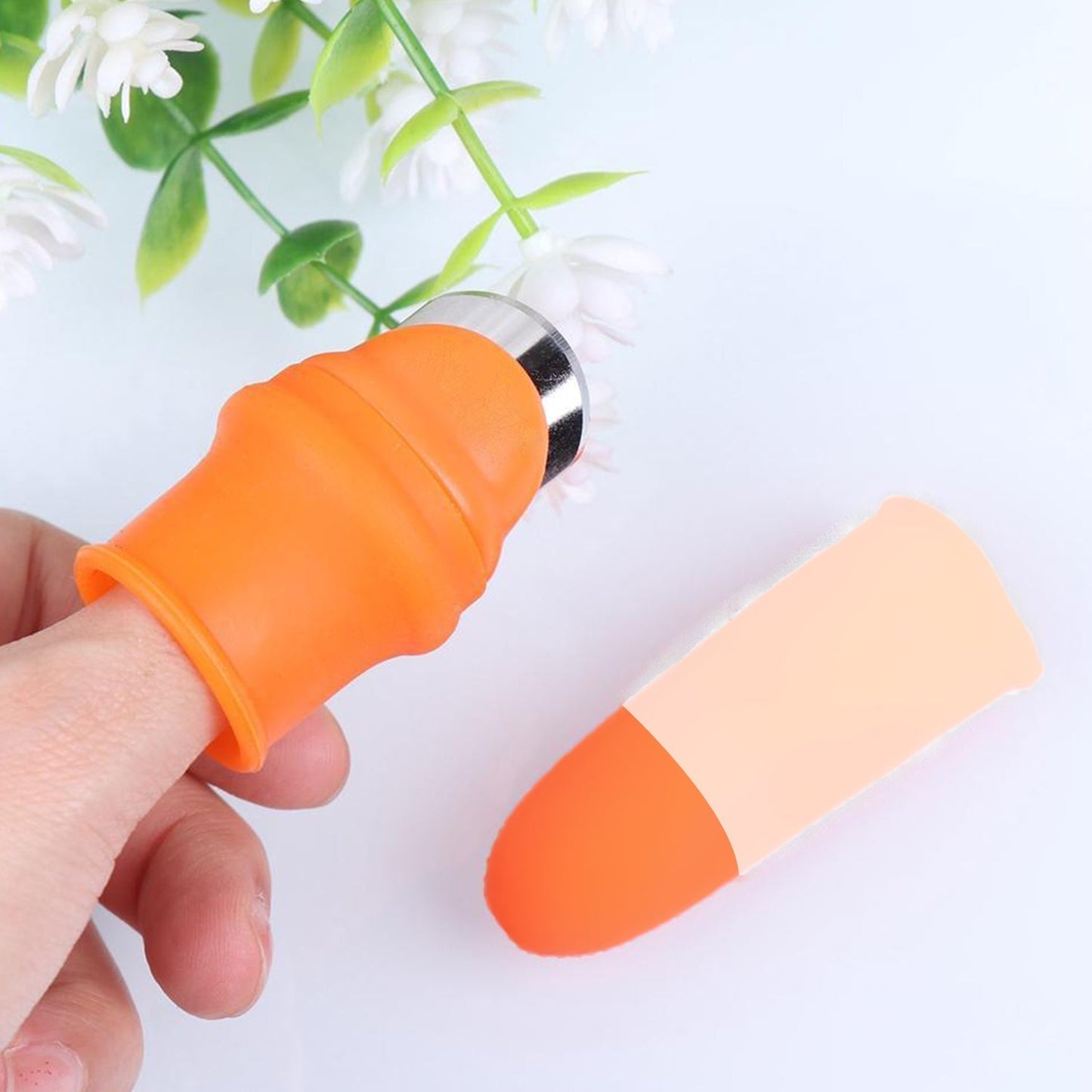A close-up of the Quickslice V Thumb Cutter, showcasing its ergonomic design.