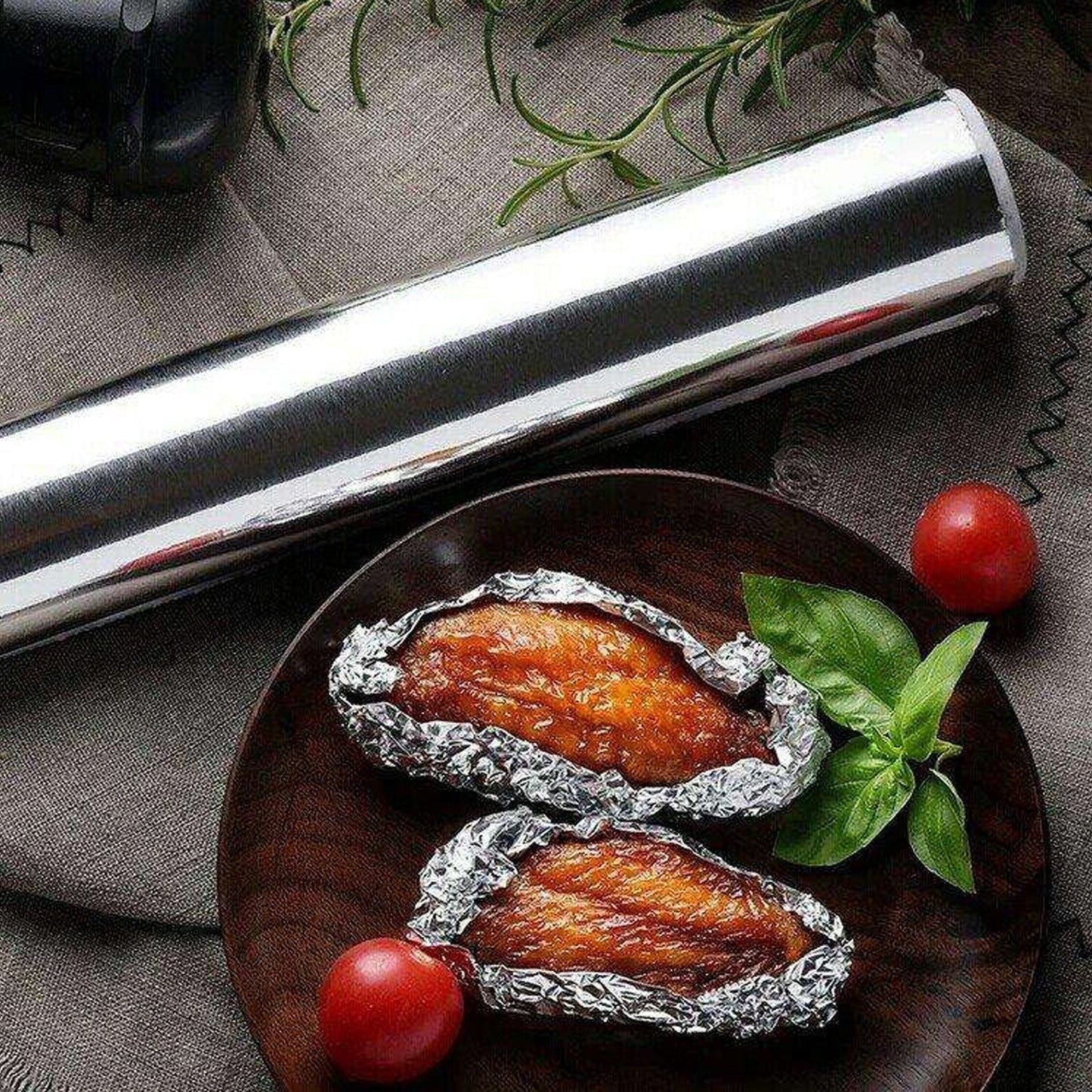 Heavy-duty non-stick aluminum foil roll for kitchen use.