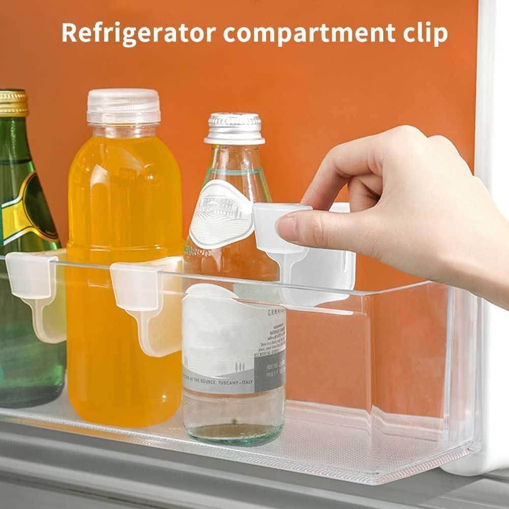 Close up of fridge storage divider showcasing adjustable plastic partition