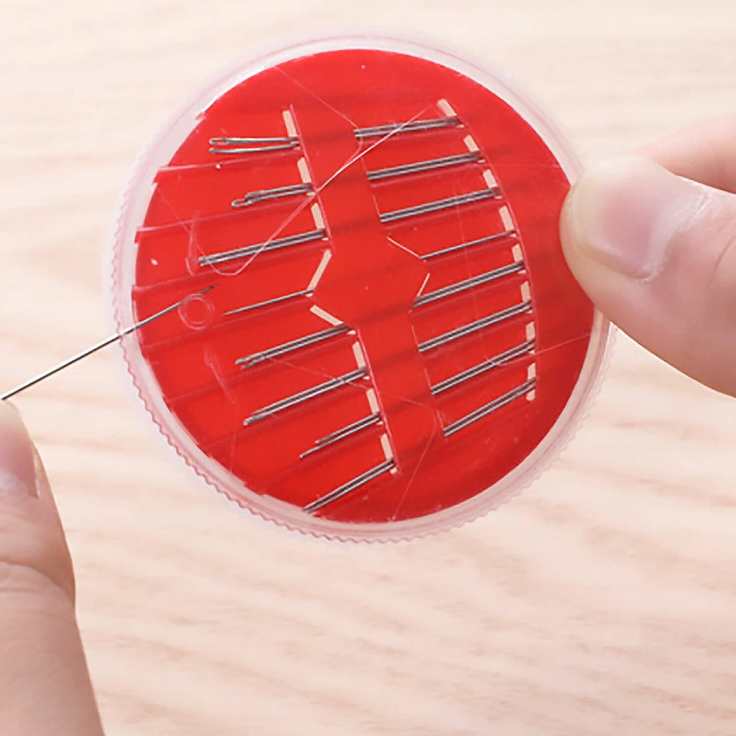 Sewing scissors and needle threader included in the kit