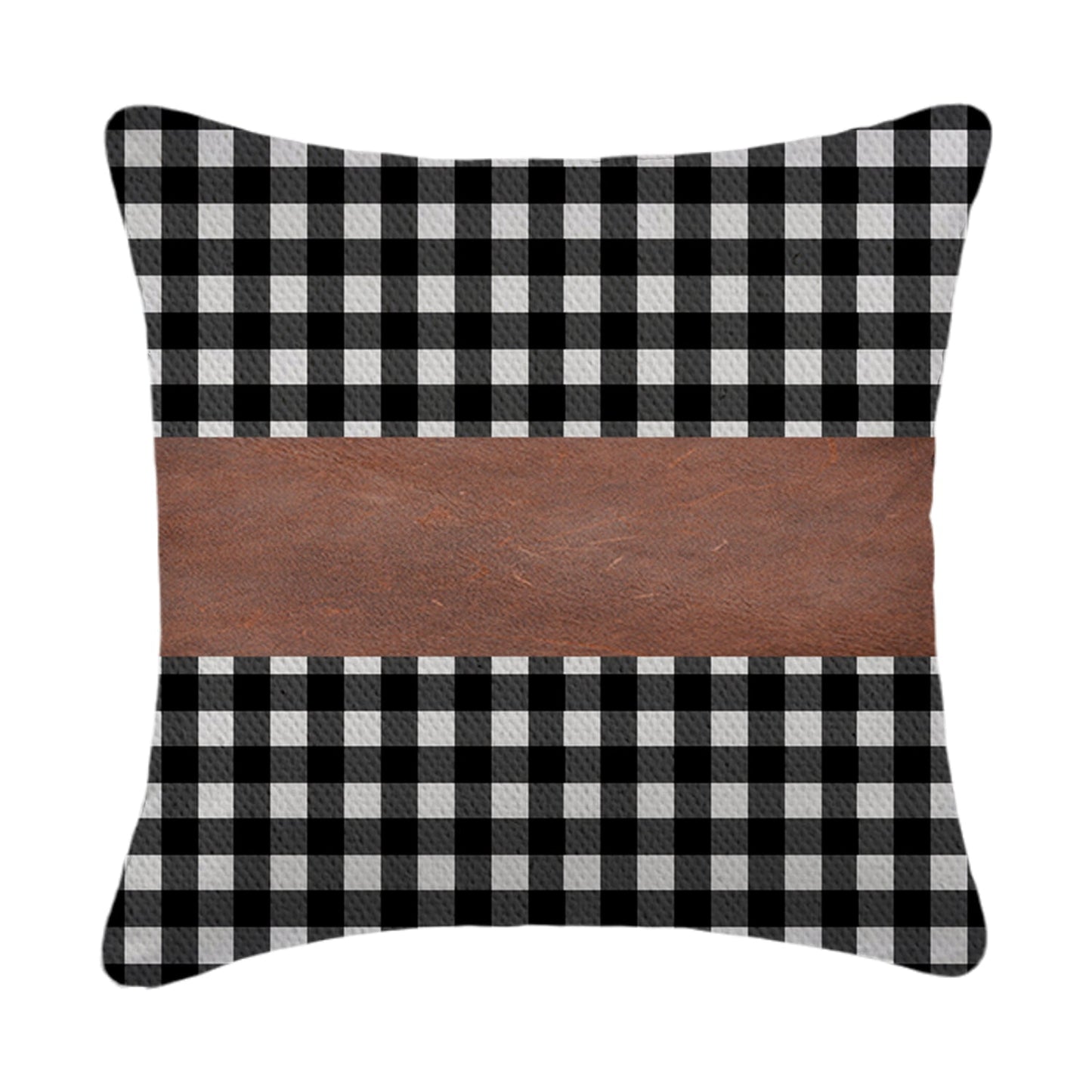 A set of contemporary leather pillow covers arranged on a comfortable armchair.
