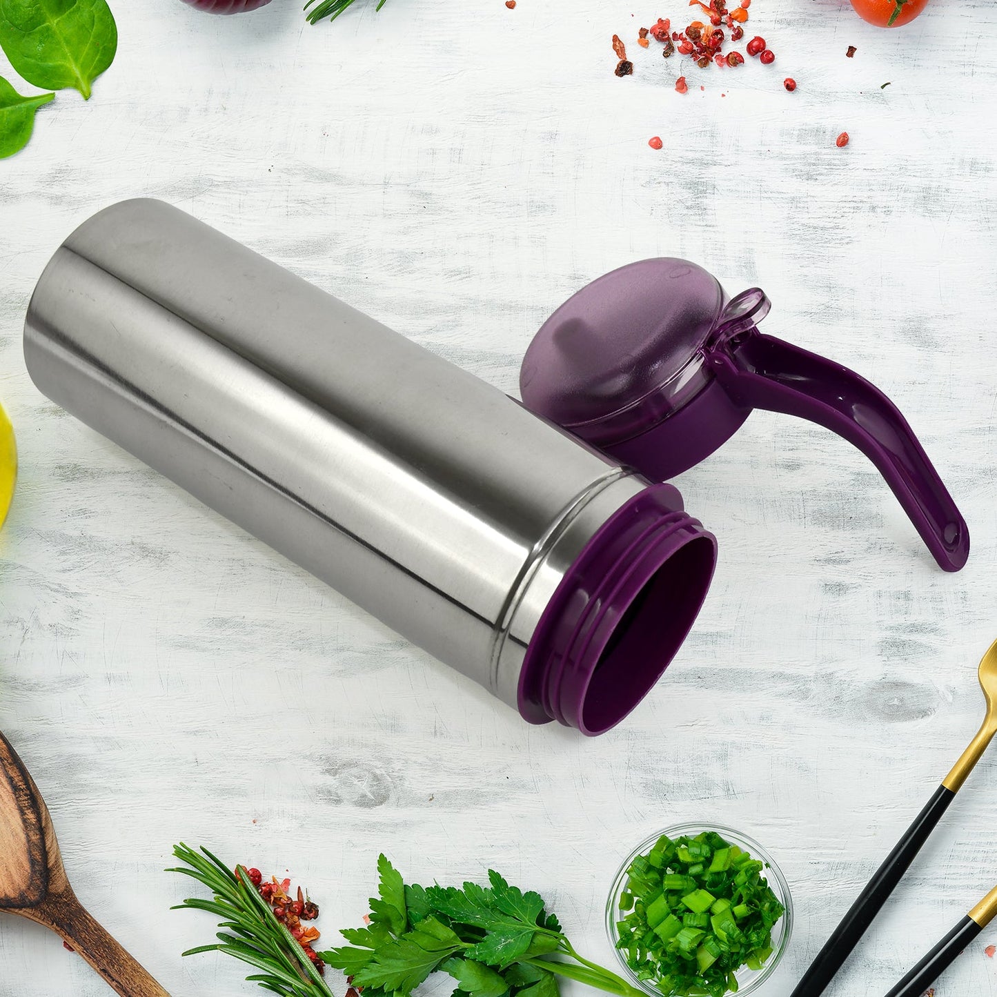 Daily use stainless steel oil dispenser with anti-spill spout