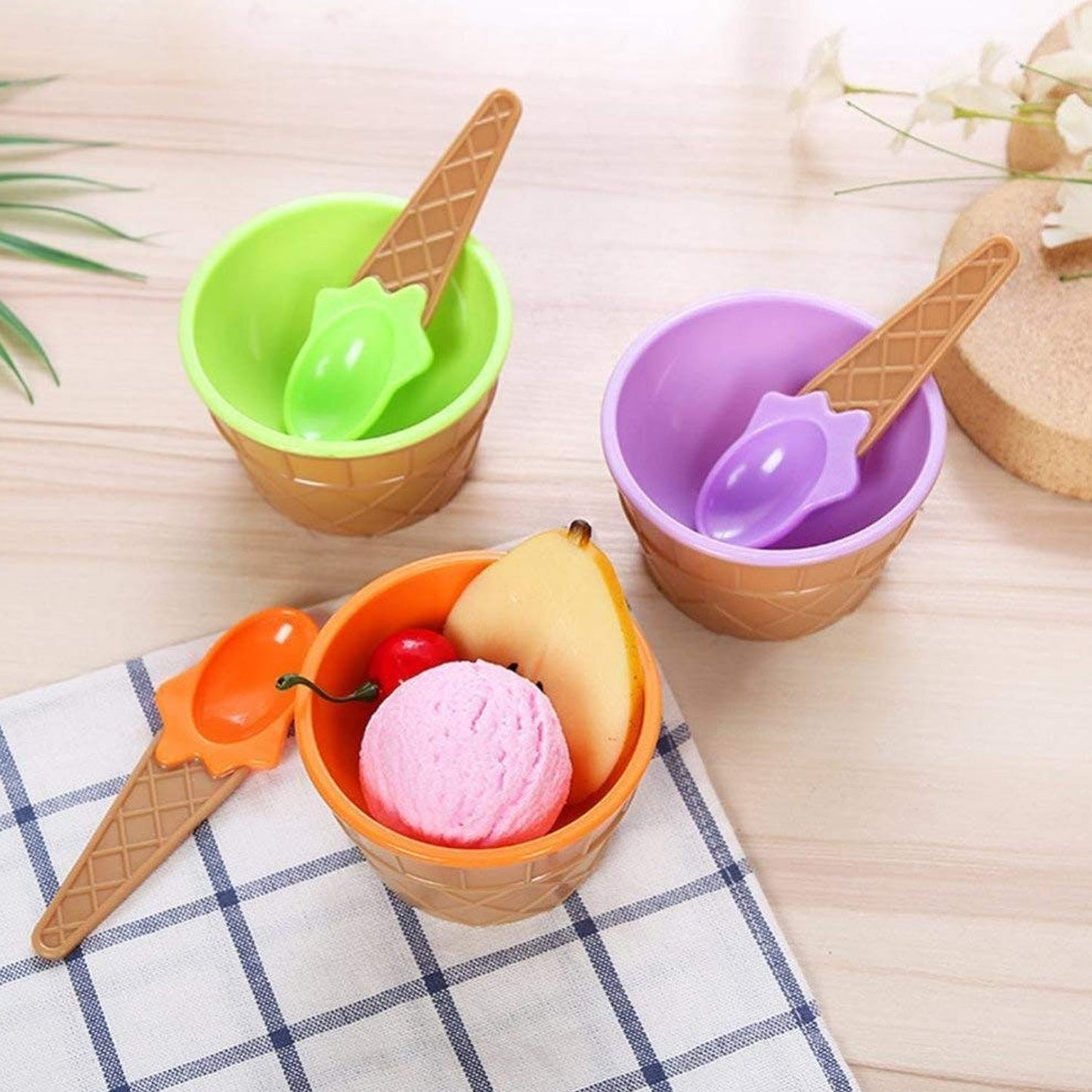 Delicious ice cream and fruit desserts served in waffle spoon bowls