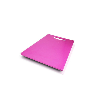 Close-up of a textured plastic chopping board surface, showing skid-proof design.