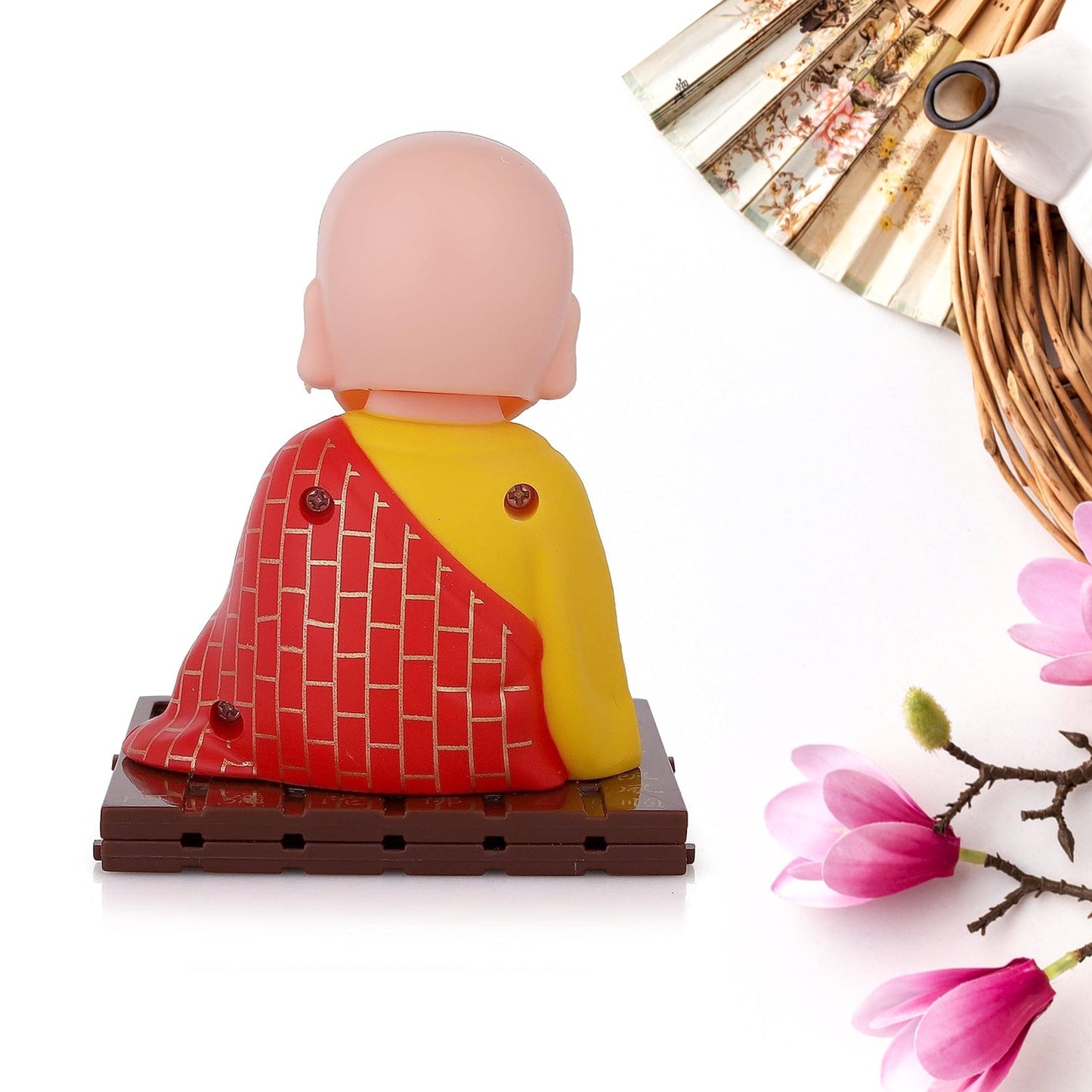 The solar-powered Buddha statue radiating peace, perfect for home decor.
