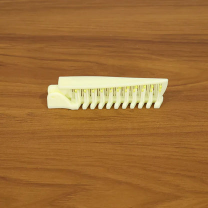 Open foldable hair comb & brush ready for styling