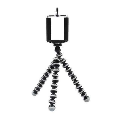 Natation flexible Gorilla Pod tripod with a DSLR camera mounted, ready for use.