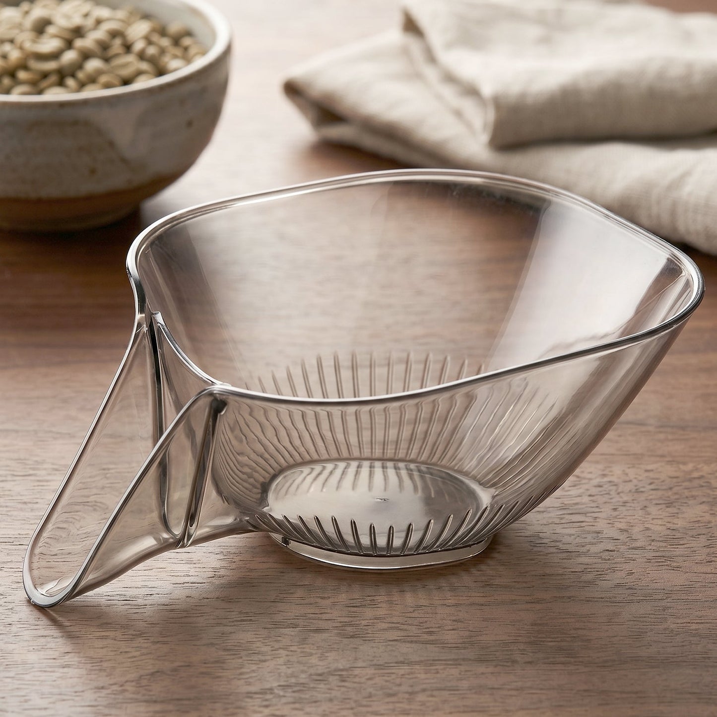 Close-up of the basket's funnel drain bottom for efficient water flow
