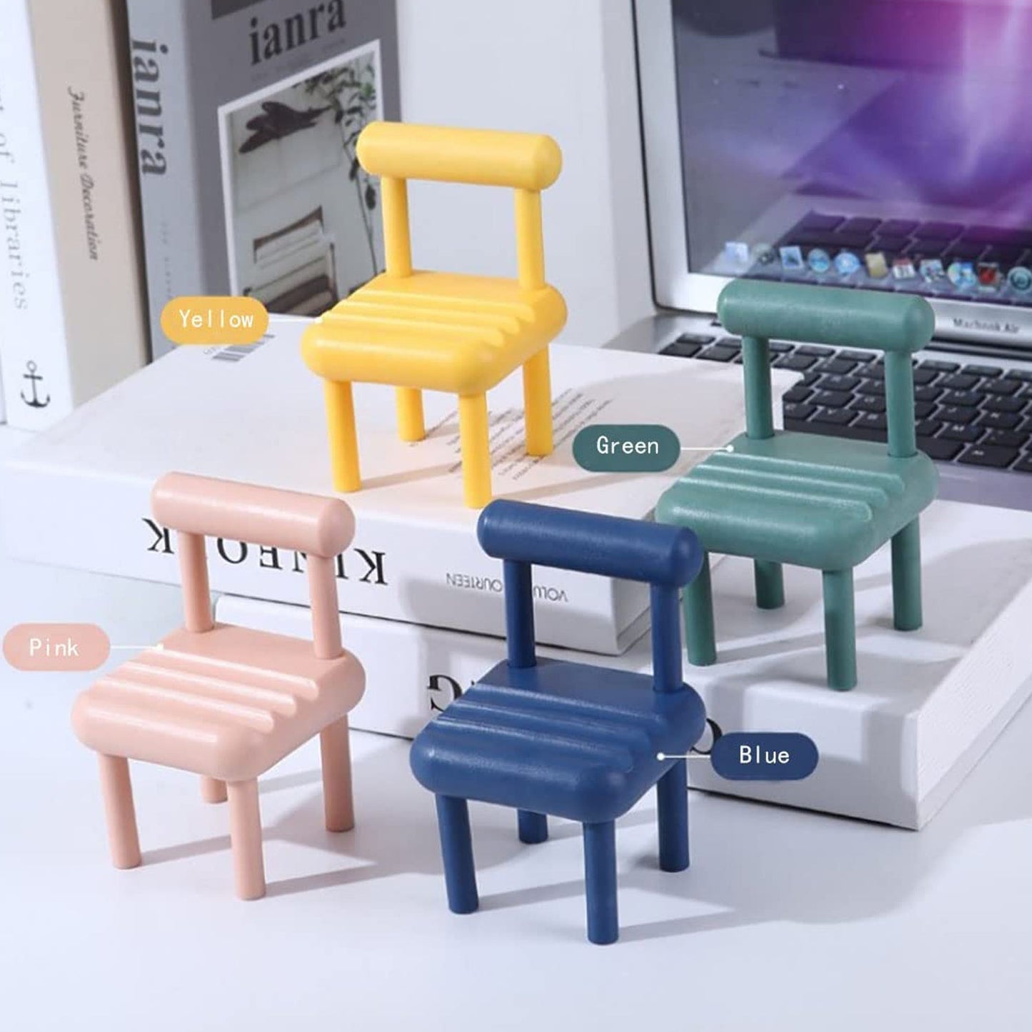 Smartphone comfortably placed in the PHOBIA desktop phone holder.