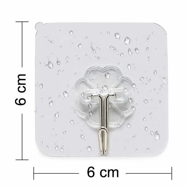 A single stainless steel adhesive hook holding a small bag.