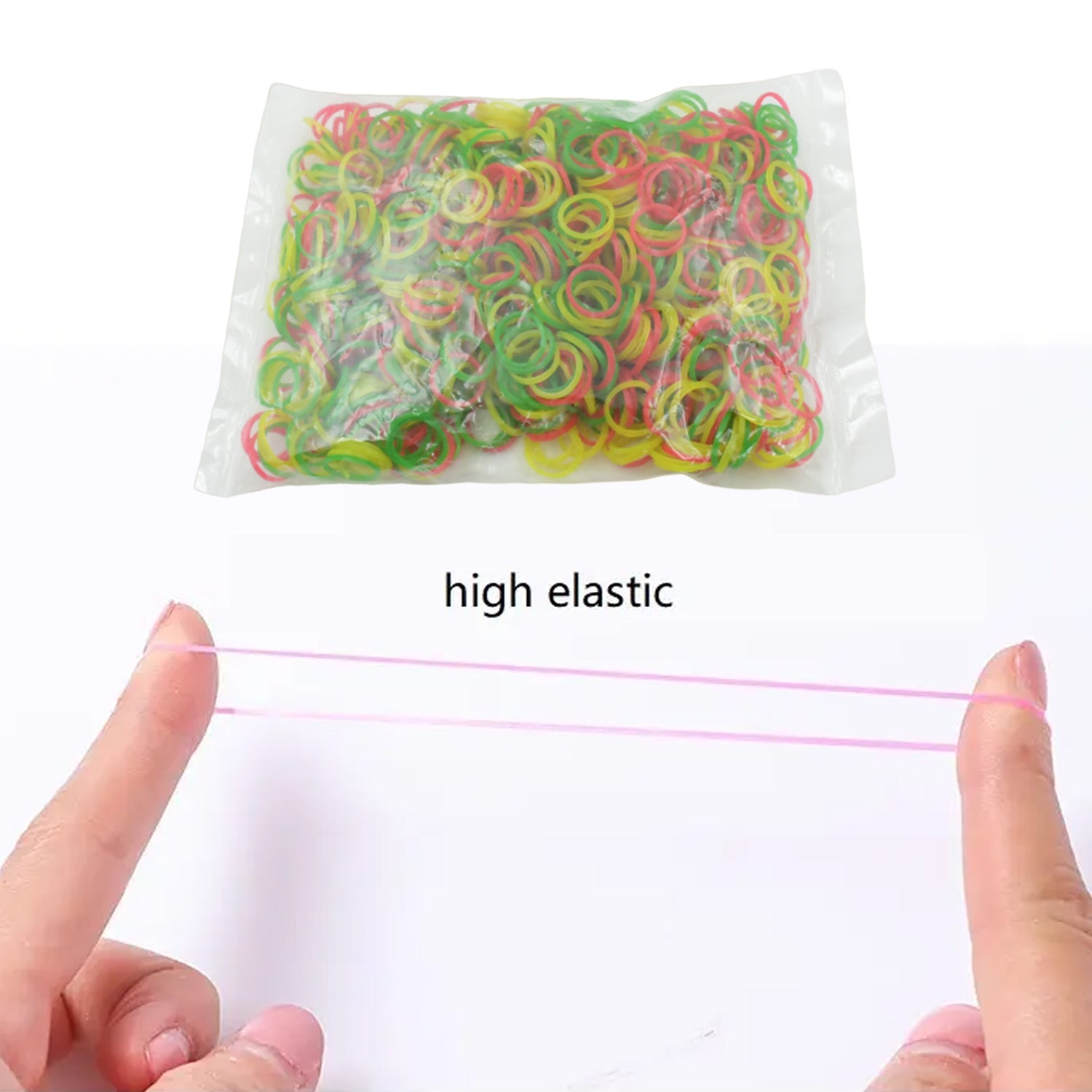 Multicolor elastic rubber bands effectively bundling a collection of stationery items on a desk.