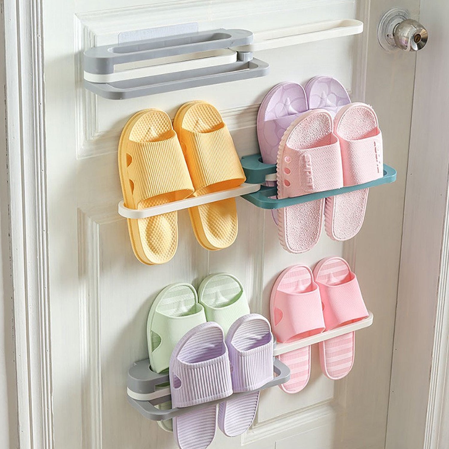 The space-saving folding shoe rack shown neatly folded flat against a wall.