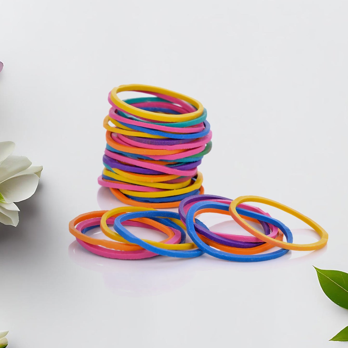 Durable nylon rubber bands keeping various electronic cables tidy and organized.