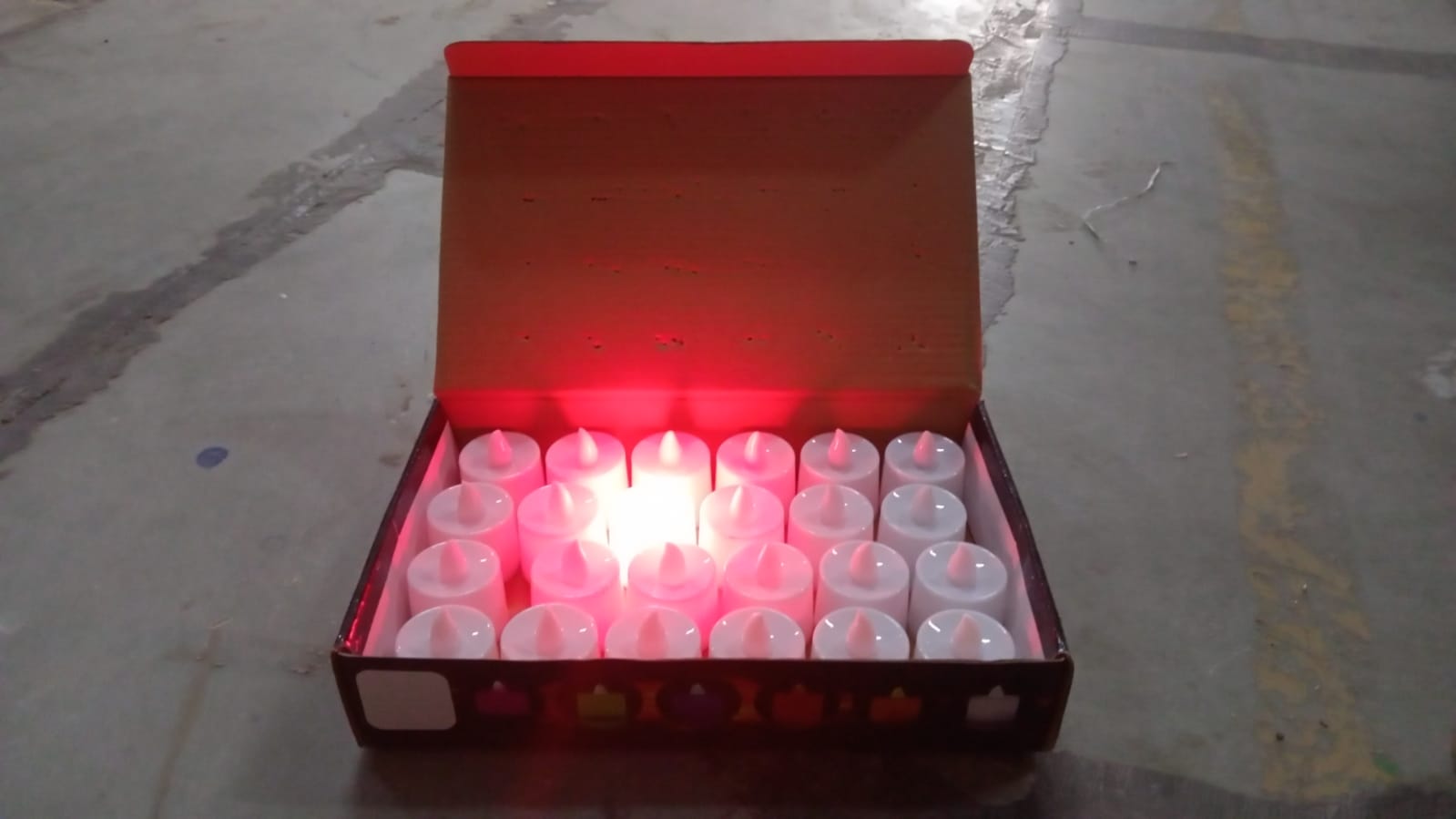 Durable plastic red LED tea light candles, safe and reusable.