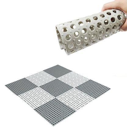 Compact anti-slip bath mat ensures safety in showers and bathtubs.