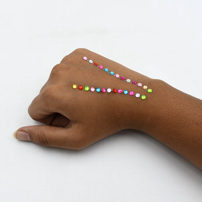 Sparkling crystal stickers in various shapes, suitable for decoration and craft applications.