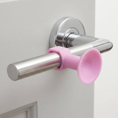 Silicone door stopper protecting wall from door handle impact