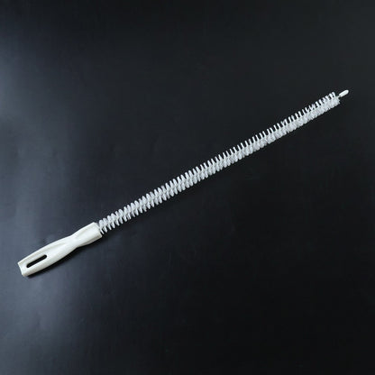Flexible long brush cleaning a kitchen sink drain
