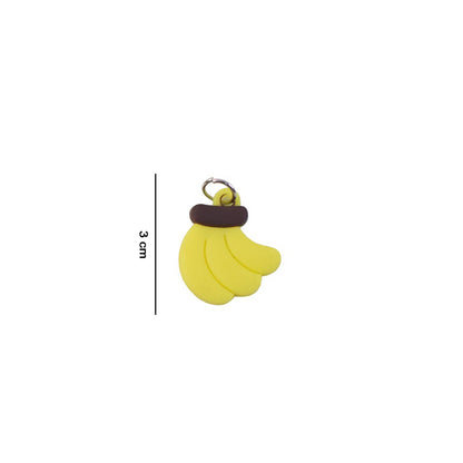 Bright banana keychain attached to a bag