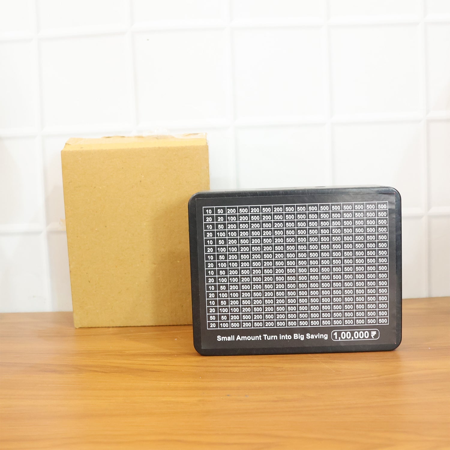 Close up image of manual reusable money box for daily saving habits