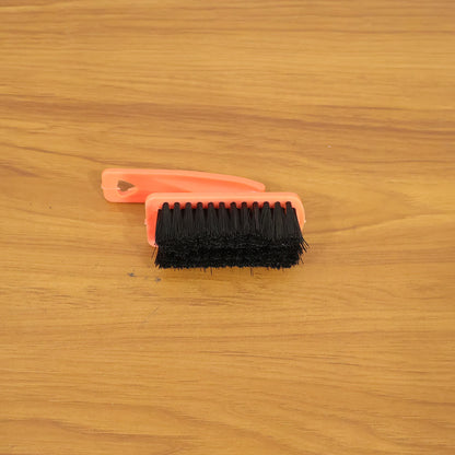 Shoe cleaning brush in live use cleaning sneakers and household surfaces
