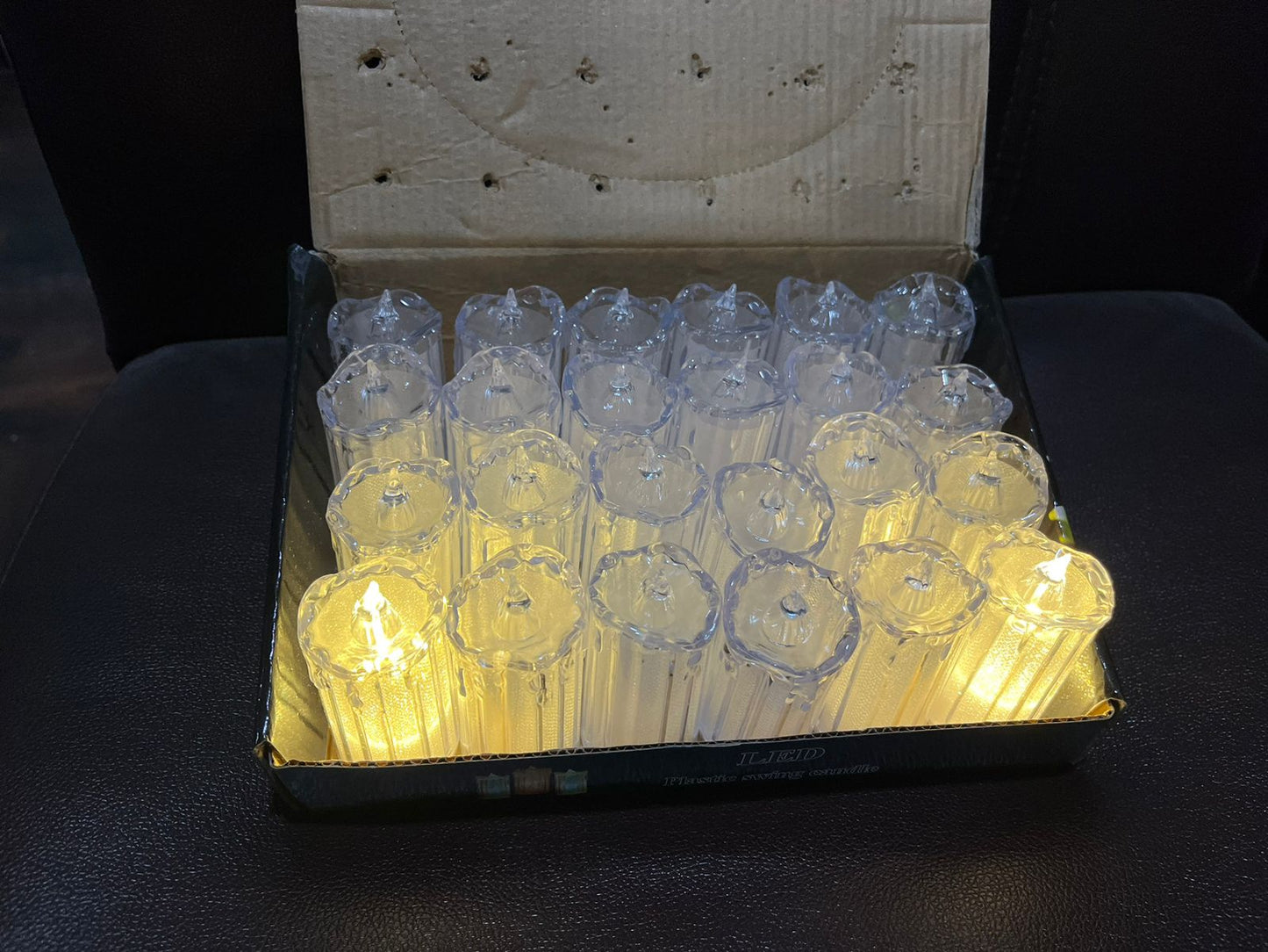 Packaging for the 24-piece flameless LED candle set, ready for gifting.