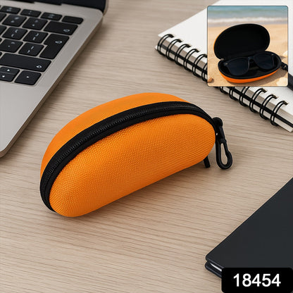 A person holding the black zipper sunglasses case, demonstrating its compact and portable design.