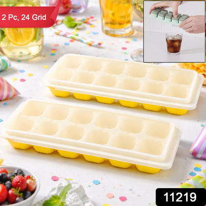 Flexible silicone pop-up ice cube tray with lid for hassle-free removal.