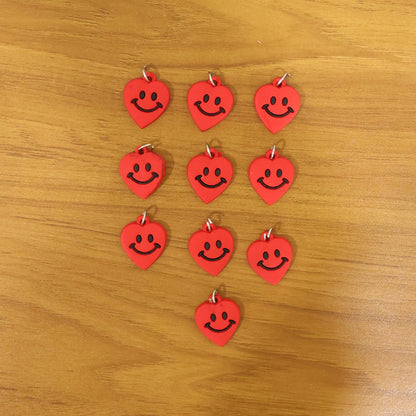 Pair of cute smiley heart keychains for gifts and accessories